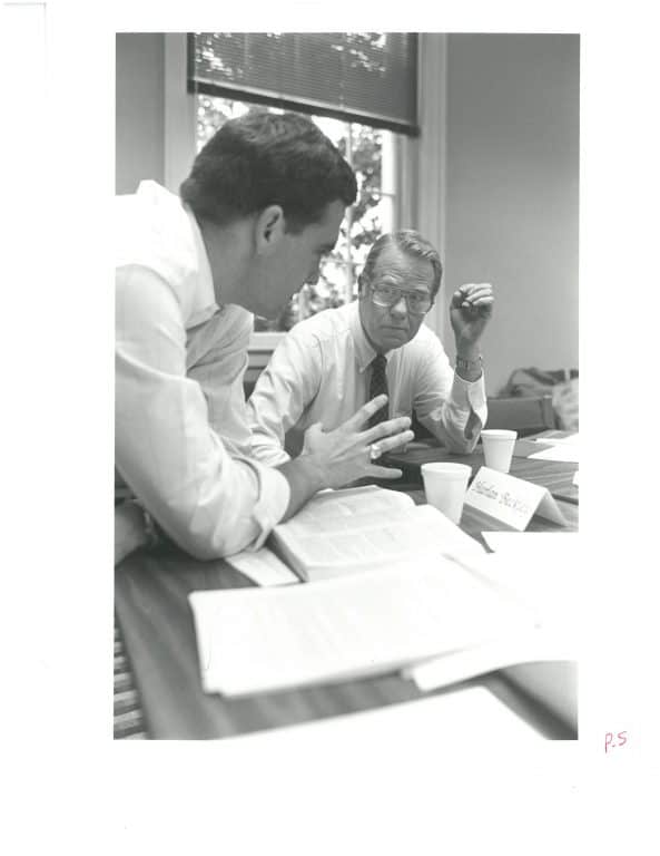 Lou Hodges and a student in discussion during a business ethics seminar in 1991.