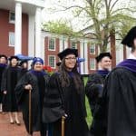 Law students make their way to their seats.