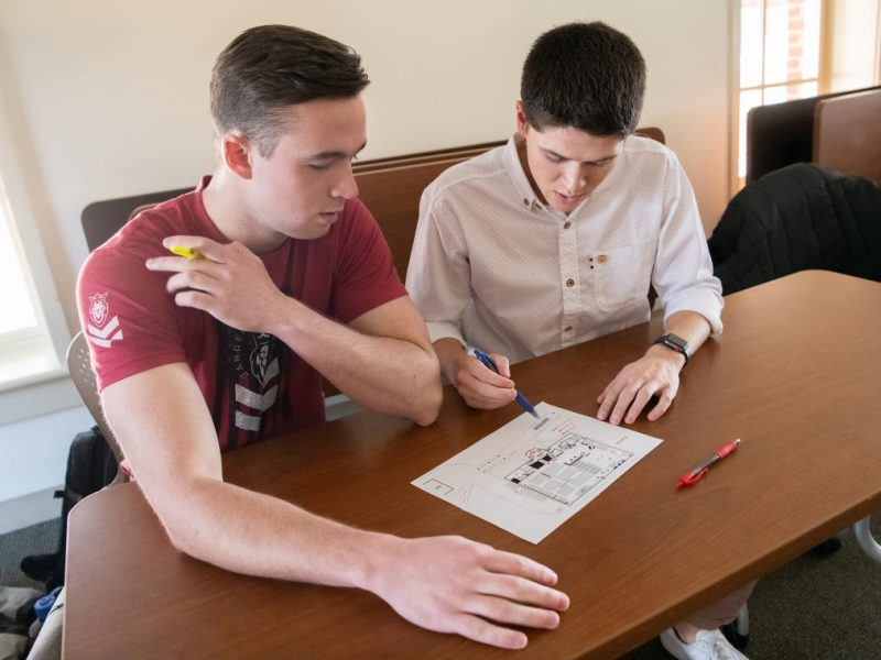 Jim Barton &#039;20 and Donald LeCompte &#039;21 go over security plans before Mock Con 2020.