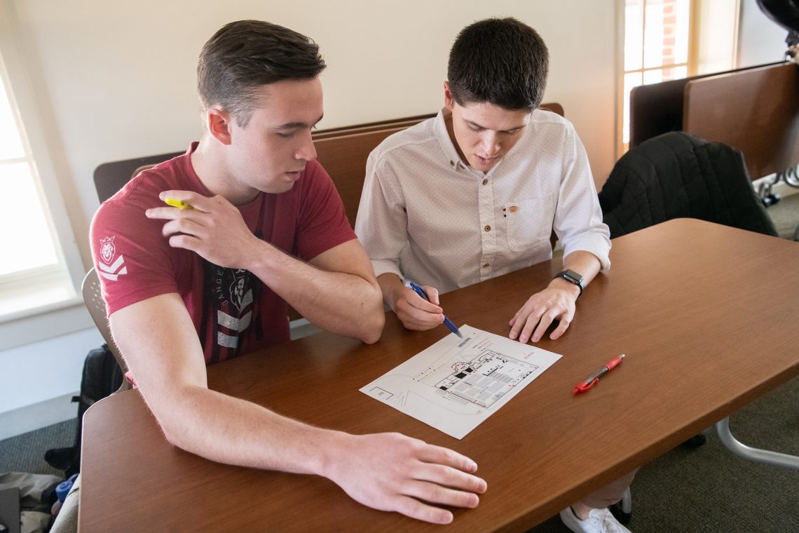 Jim Barton &#039;20 and Donald LeCompte &#039;21 go over security plans before Mock Con 2020.