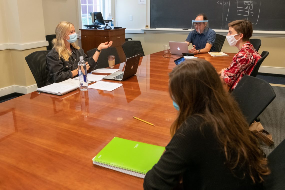 Professor of Religion Jeff Kosky sports a face shield in his Washington Hall capstone class.