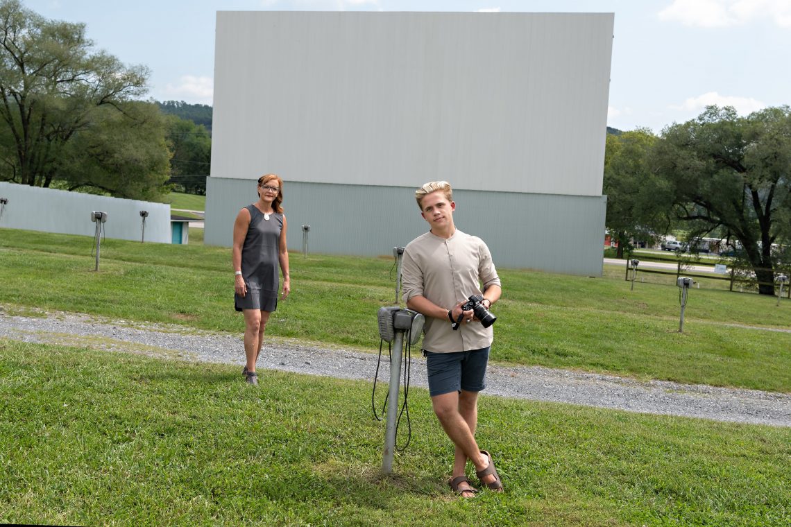 Professor Stephanie Sandberg and Nolan Zunk '22 at Hull's Drive-in, where their documentary "Intimate Violence" will be screened to raise money for Project Horizon.