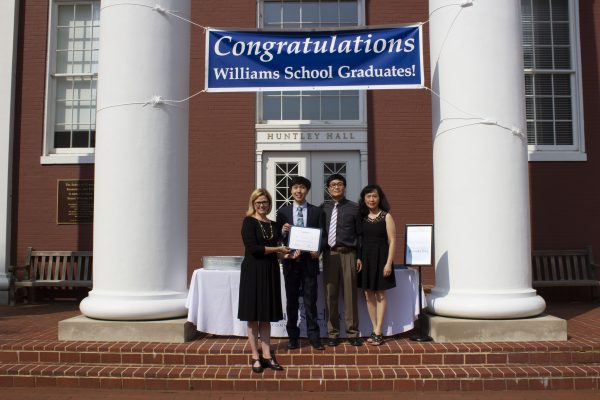 Prof.-Amanda-Bower-presents-Chi-Shing-Adrian-Lam-’21-with-the-Business-Administration-Award-600x400 Williams School Congratulates Class of 2021 Award Winners
