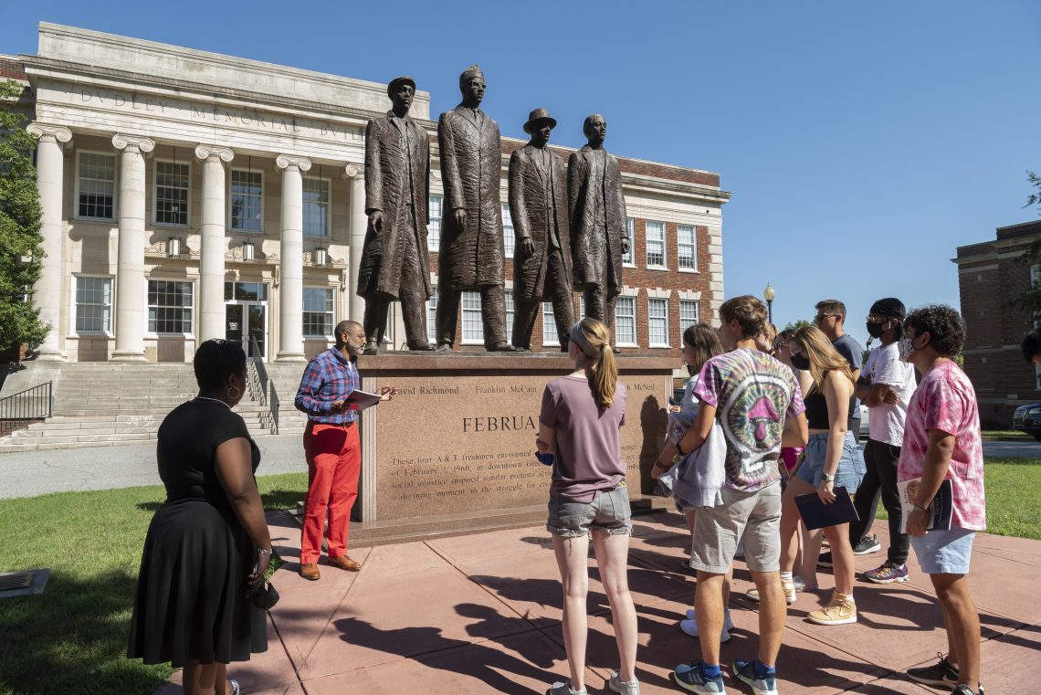 The Freedom Ride pre-orientation group visits the February One Monument.