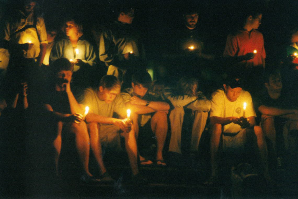 Students mourn the overwhelming losses of 9/11 at a candlelight vigil on the chapel steps on Sept. 12, 2001.