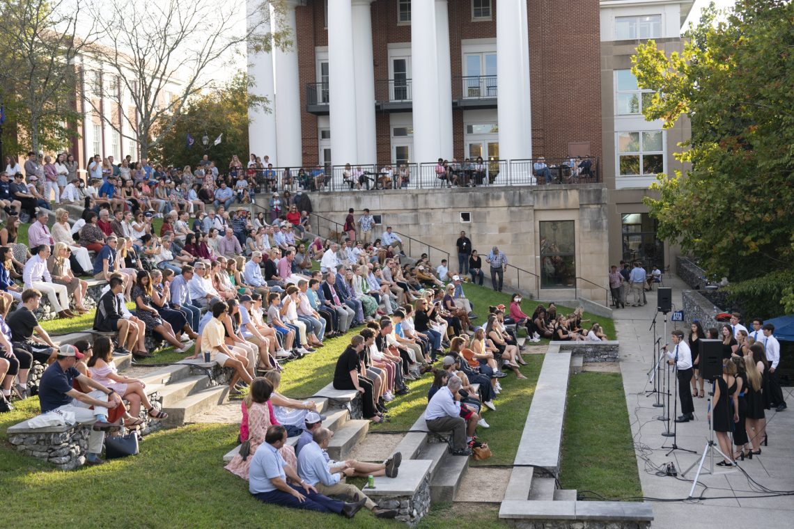Parents and Family Weekend guests enjoy an a capella concert in Cohen Family Amphitheater.