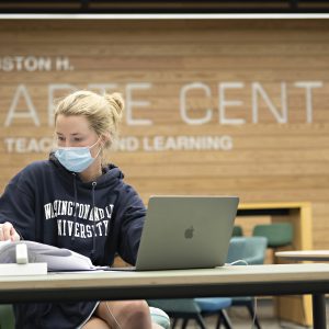 Eliza Cotchett ’22 finds a prime spot to work in the new Harte Center.