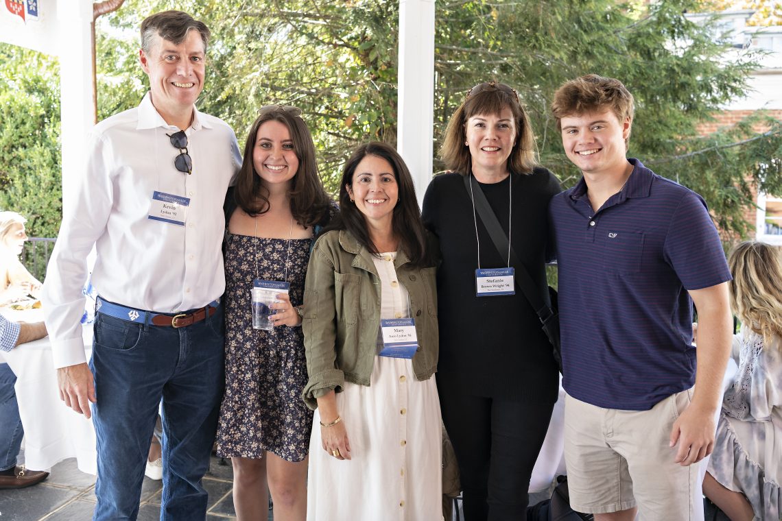 Katie Lydon &#039;22 and Wyatt Wright &#039;24 with their alumni parents during a children of alumni luncheon at Hotchkiss House.