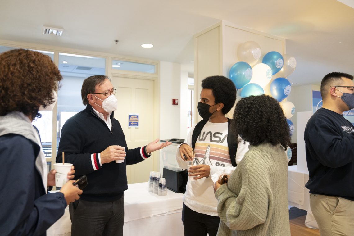 Tom Camden, director of Special Collections and Archives, chats with students at the first-generation student celebration.
