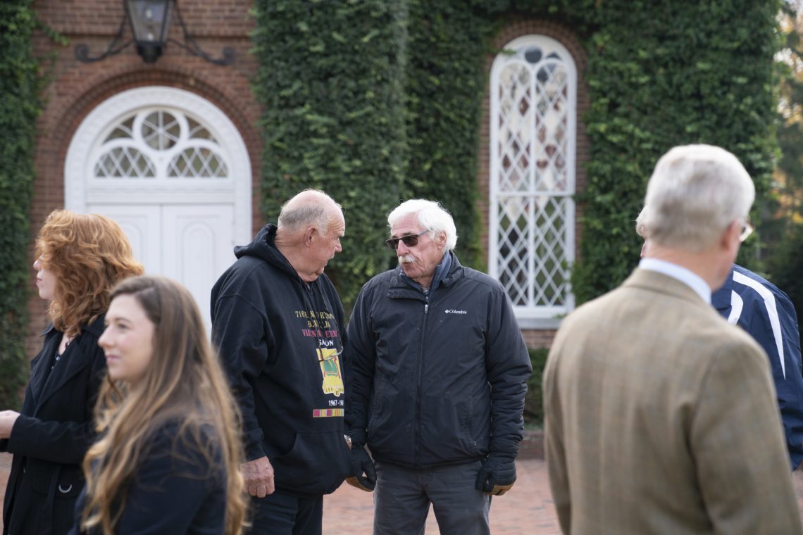 Mike Young and Laurie Lipscomb catch up before the event begins.