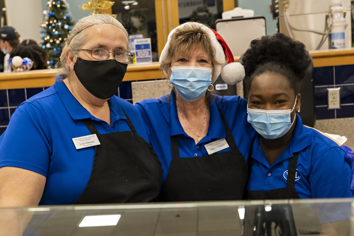 Marketplace employees Lisa Johnson, Tammy Dunbar and Asiah Franklin pause for a quick pic during holiday dinner service.