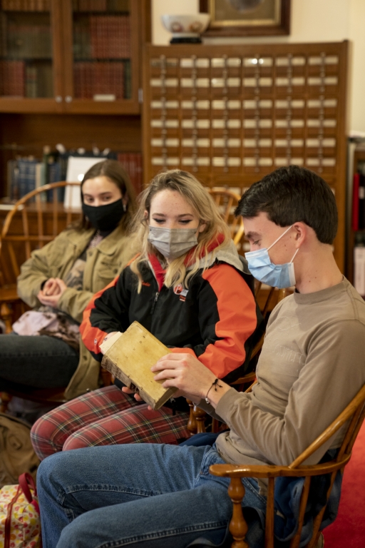 Powhatan High School students handle rare materials during a field trip to W&amp;L Special Collections and Archives.