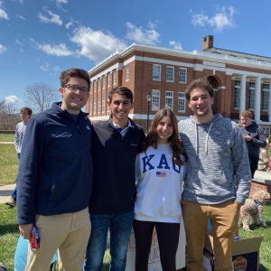 Weinstein Scholars Ian Bodenheimer &#039;22, Tyler Waldman &#039;24, Sophie Huber &#039;25, and Andrew Tartakovsky &#039;23 at Pass the Plate, a cultural food-tasting event they planned.