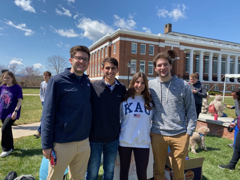 Weinstein Scholars Ian Bodenheimer &#039;22, Tyler Waldman &#039;24, Sophie Huber &#039;25, and Andrew Tartakovsky &#039;23 at Pass the Plate, a cultural food-tasting event they planned.