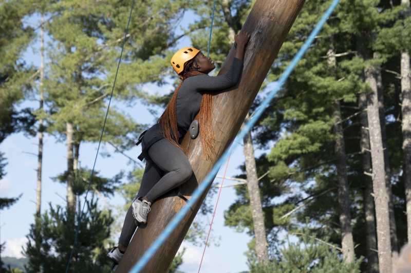 The Beyond LEADership Leading Edge trip climbs the campus Alpine Tower ropes course.
