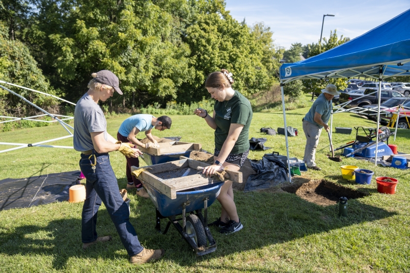 The Archaeology Leading Edge trip does field work on back campus.