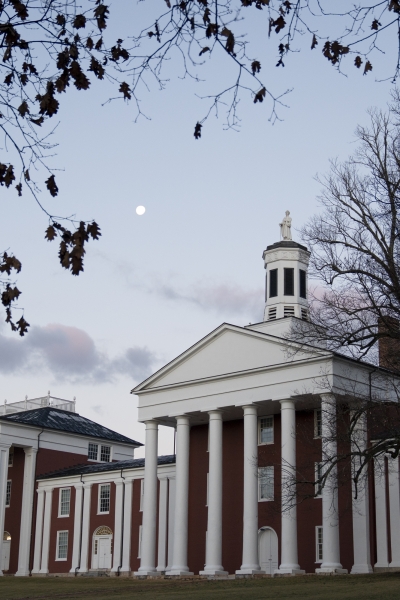The moon sets behind the Colonnade.
