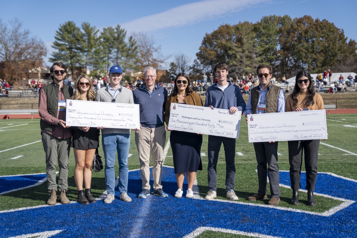 5th and 10th Reunion Gifts and the 2023 Senior Gift are presented to President Will Dudley at halftime of the football game during Young Alumni Weekend.