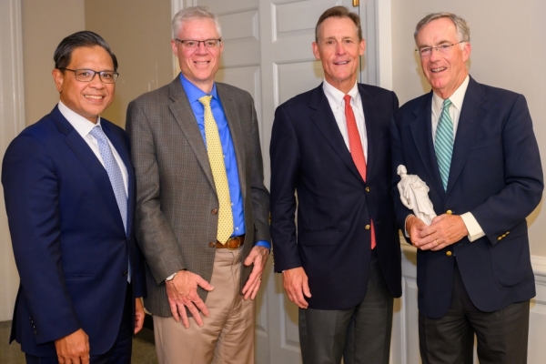 Wali Bacdayan, rector of the W&L Board of Trustees, Will Dudley, president of W&L, Russell Hardin, president of the Lettie Pate Evans Foundation, and Jenner Wood III, chair of the Lettie Pate Evans Foundation Board of Trustees.