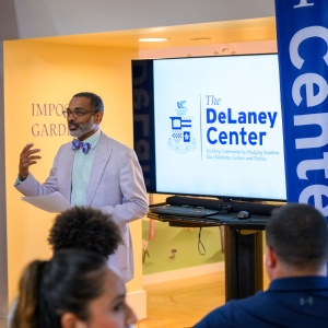 Director of the DeLaney Center and professor of Africana Studies Michael Hill speaks at a DeLaney Center open house in Watson Pavilion.