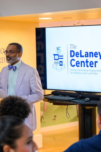 Director of the DeLaney Center and professor of Africana Studies Michael Hill speaks at a DeLaney Center open house in Watson Pavilion.