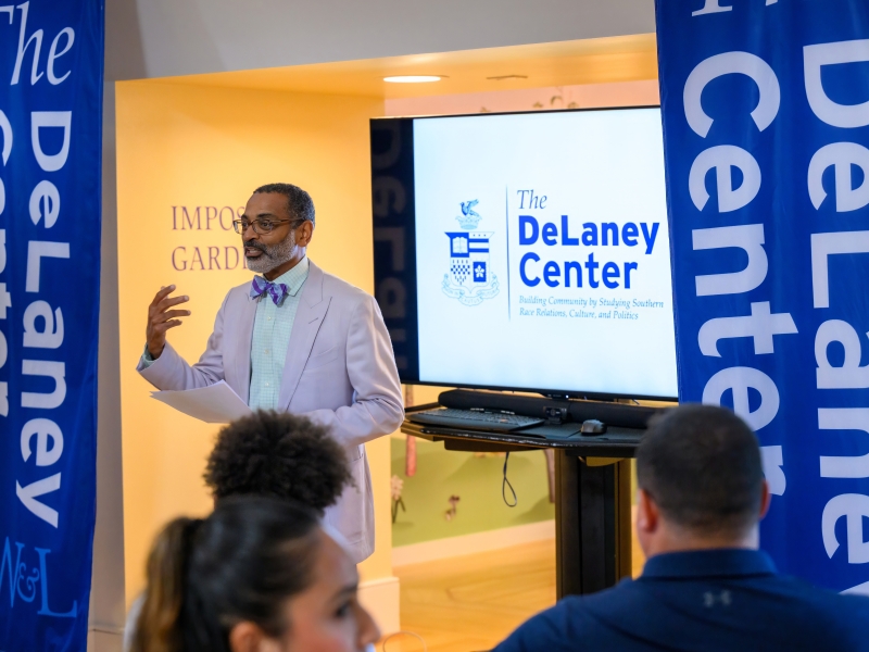 Director of the DeLaney Center and professor of Africana Studies Michael Hill speaks at a DeLaney Center open house in Watson Pavilion.
