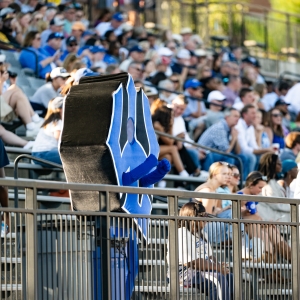 Tridy cheers on the football team during Parents and Family Weekend.