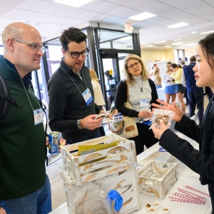 Anna Lee ’28 shares the granola she makes at the Student Showcase during the Entrepreneurship Summit in Leyburn Library.