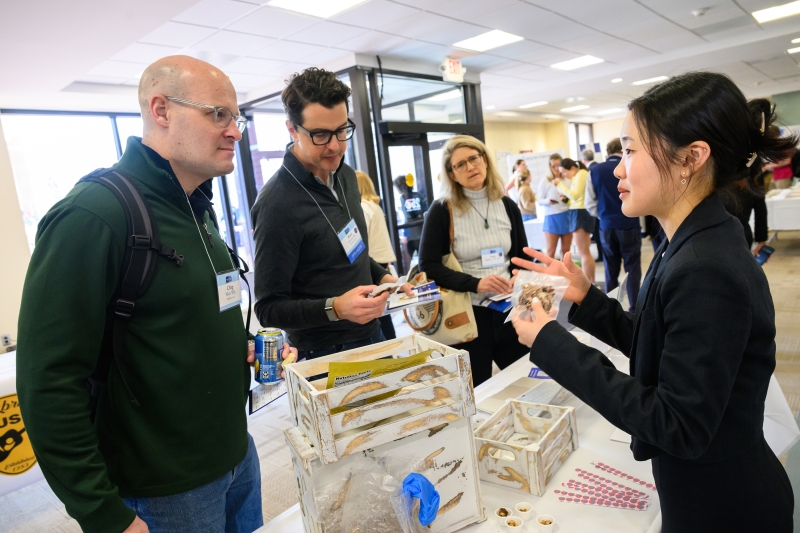 Anna Lee ’28 shares the granola she makes at the Student Showcase during the Entrepreneurship Summit in Leyburn Library.
